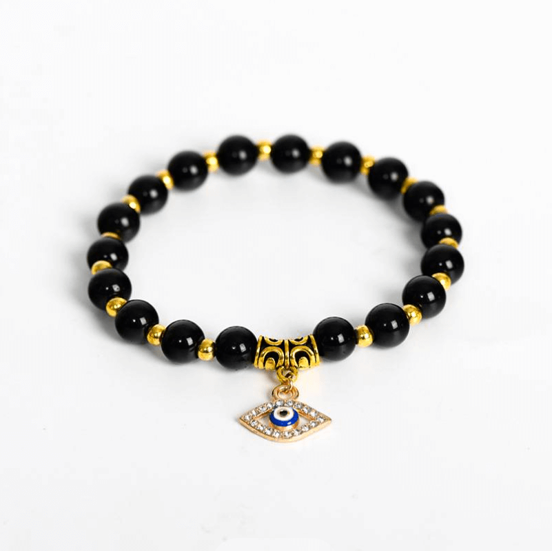 Elegant black and gold Evil Eye Bracelet for protection against evil gazes and malicious influences.