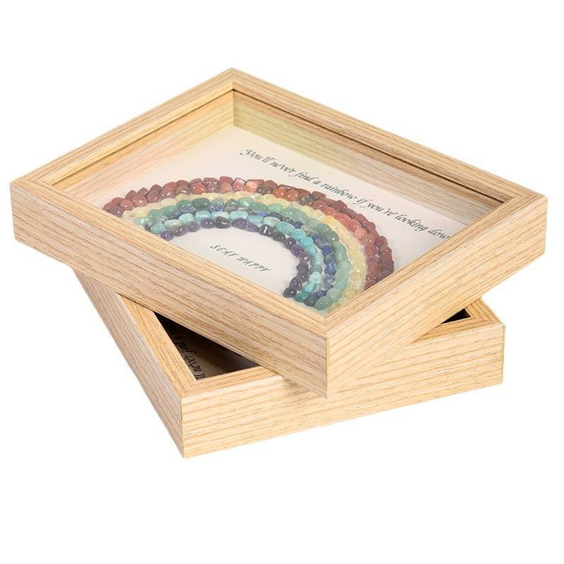 Rainbow Crystal Decorative Picture Frame with wooden borders displaying colorful crystals arranged in a rainbow pattern.