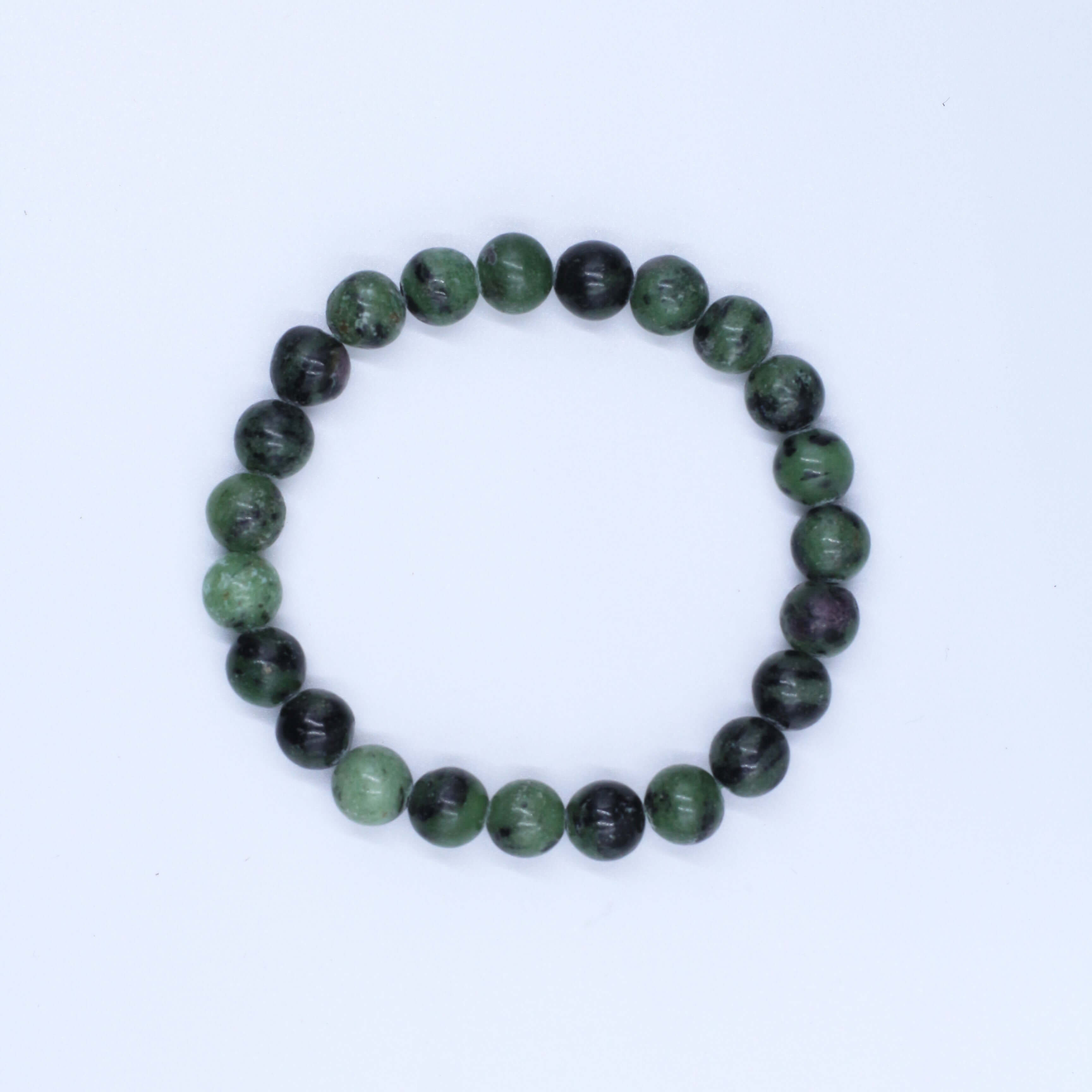 Mysterious Zoisite Bracelet with deep red-green beads enhancing spiritual wisdom and uniqueness.