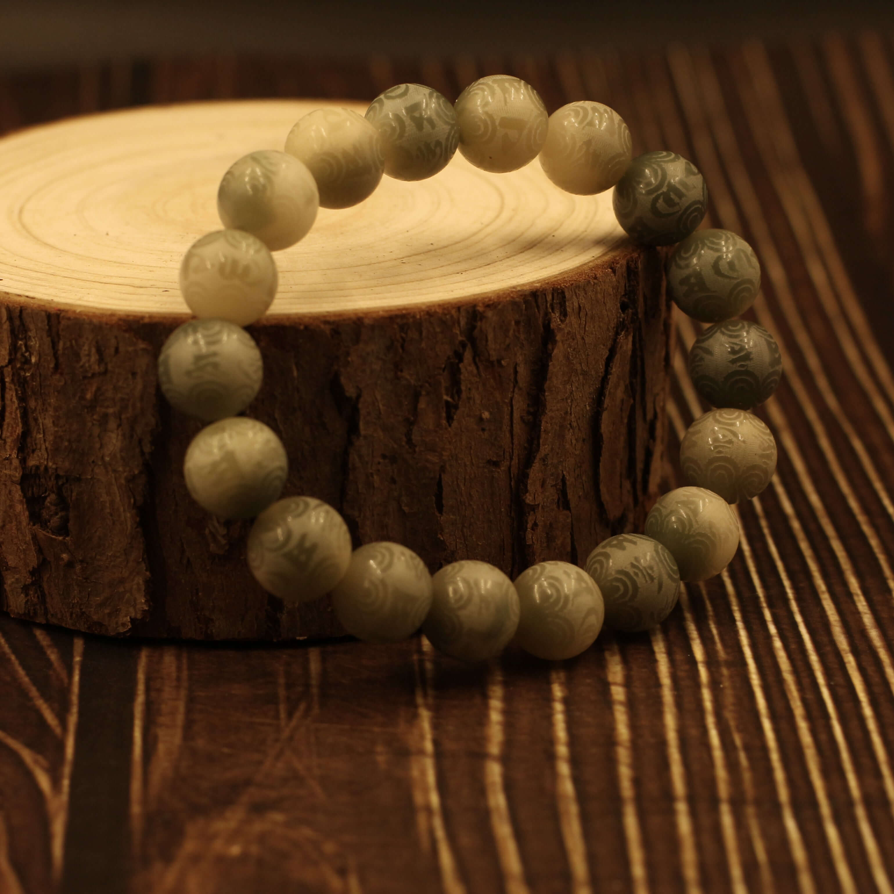 Mani Mantra Bracelet on wooden display - Strengthen Spiritual Power