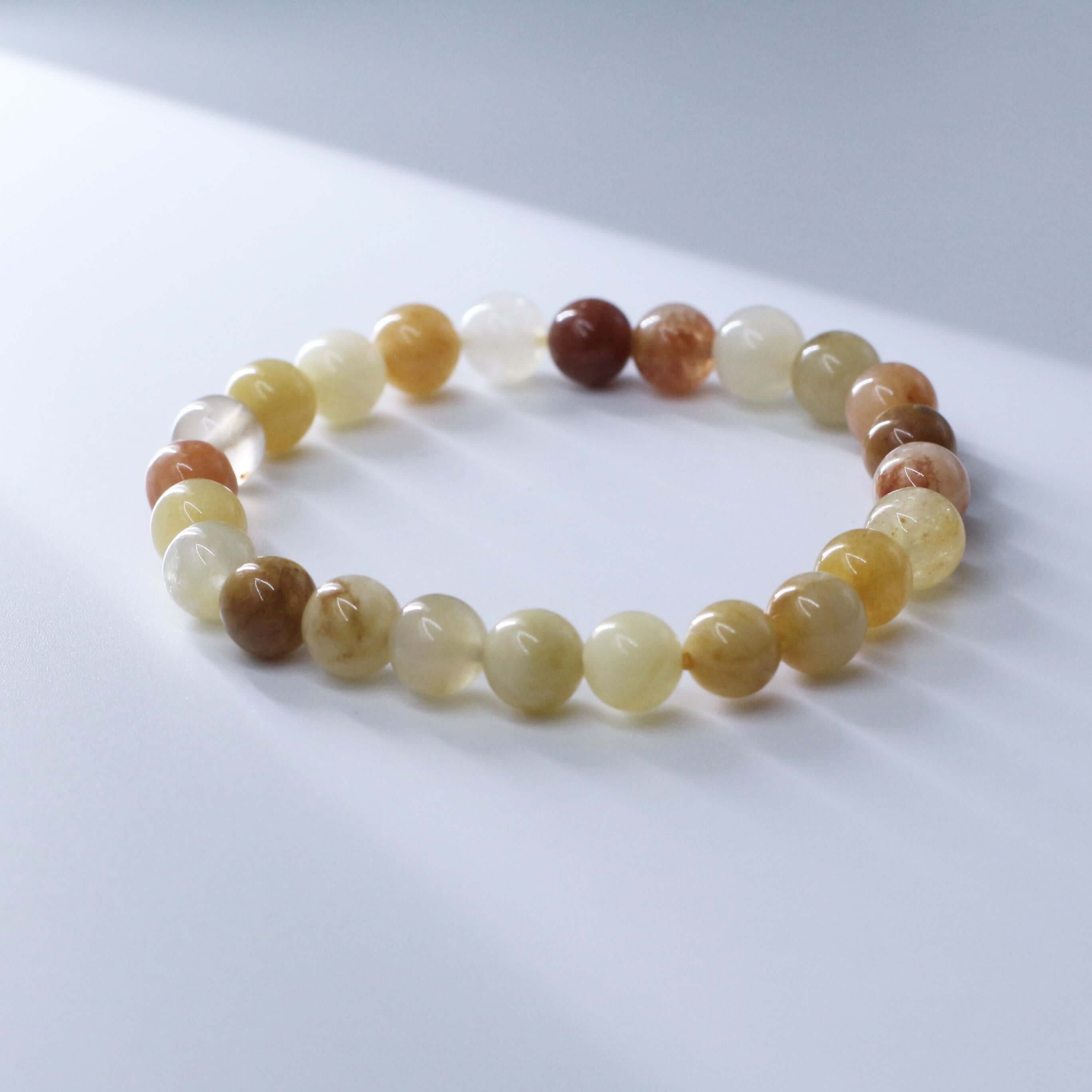 Noble Gold Silk Jade Bracelet for wealth attraction and prosperity enhancement.