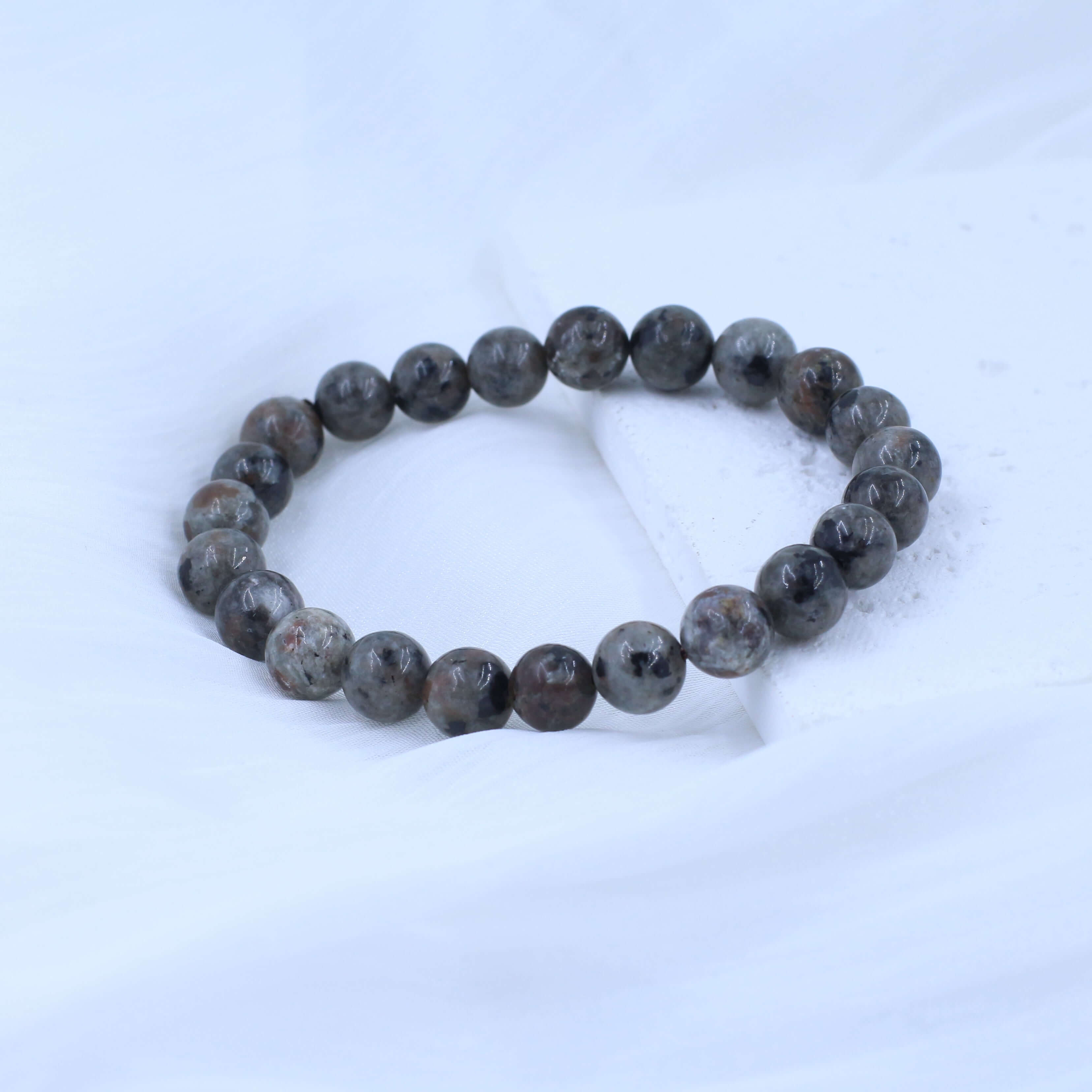 Unique Lava Stone Bracelet - Energy with natural crystal beads on a white background.